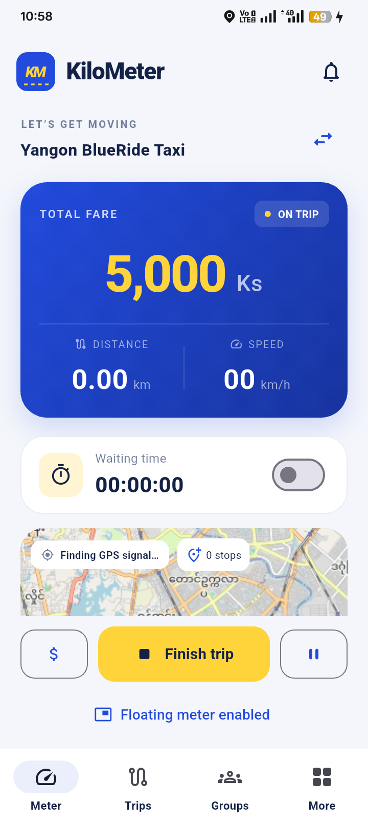 KiloMeter taxi meter showing a 5,000 Ks fare, distance, waiting switch, map, and finish-trip button